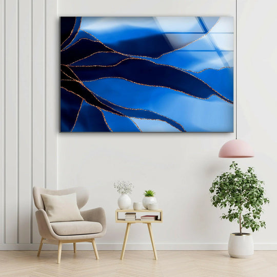 This vibrant blue and gold abstract glass wall art, featuring shimmering gold accents, showcases the quality of best glass art.