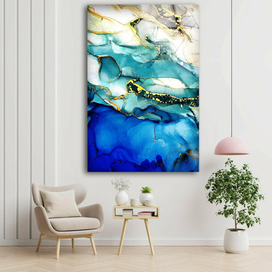 Abstract vertical hanging wall art with fluid blue and gold ink shapes.