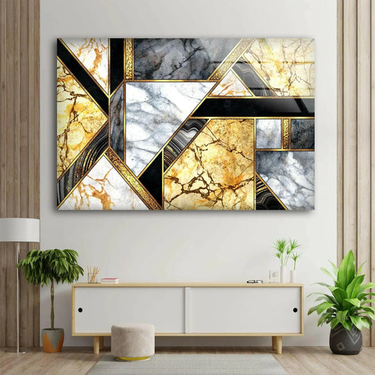 Emerging from the shadows, gold granite marble wall prints are highlighted by the interplay of light and dark geometric shapes.