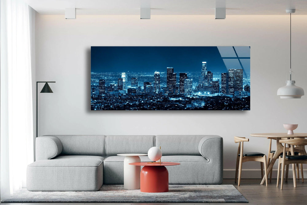 Glossy finish enhances the Los Angeles city landscape glass printing of the wall art, creating a vibrant night skyline effect.