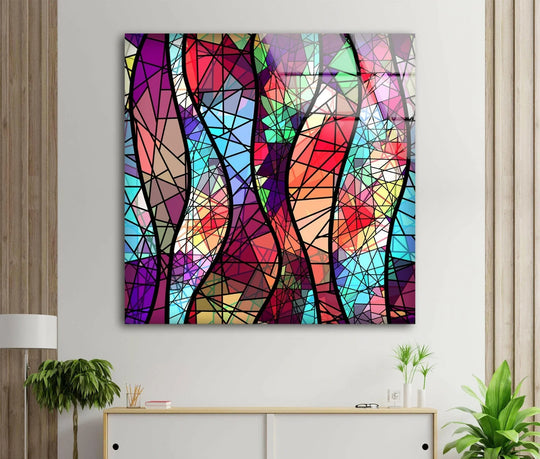 Abstract art from glass features dark purple and black outlines in a stained glass effect.