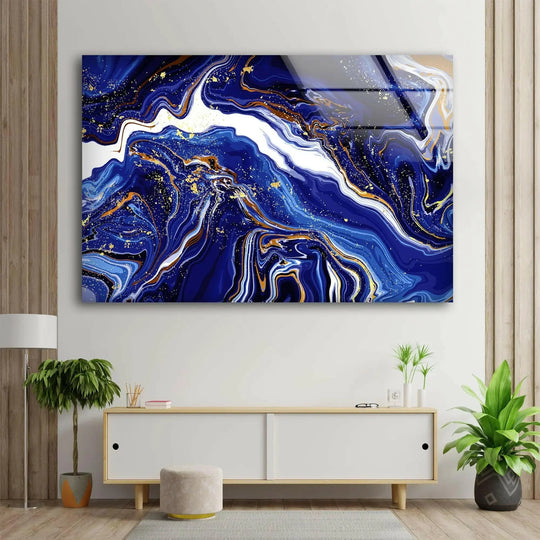Luxurious glass wall artwork features deep navy marble swirls with shimmering gold accents for a premium feel.