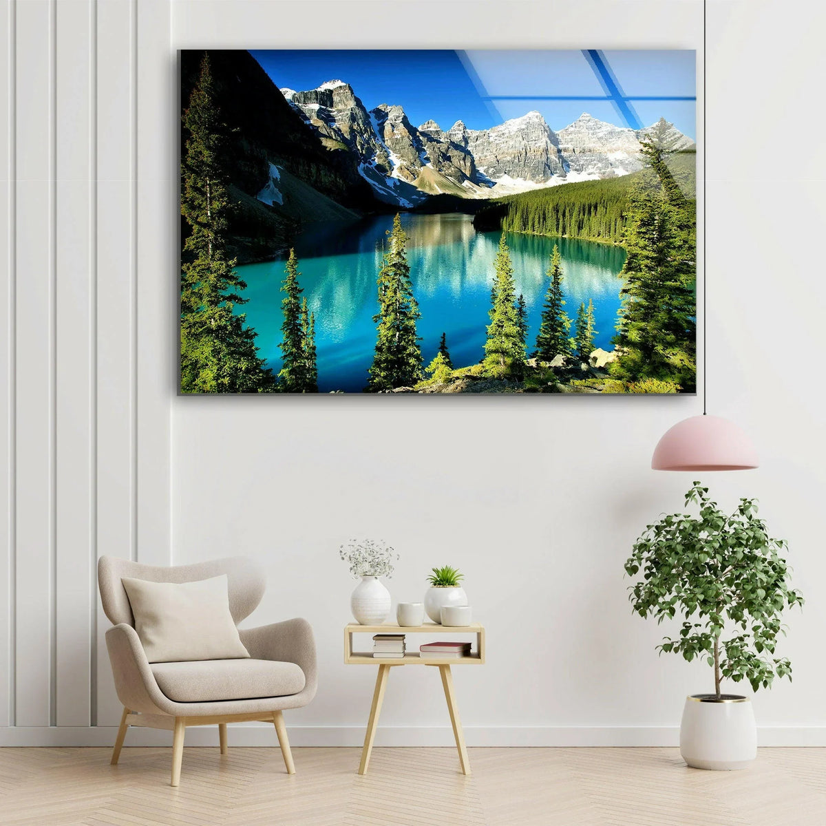 Reflecting in its depths, the stunning turquoise mountain lake glass art painting beautifully illustrates the gentle transition between the deep blue water, verdant forest, and snow-capped mountains.