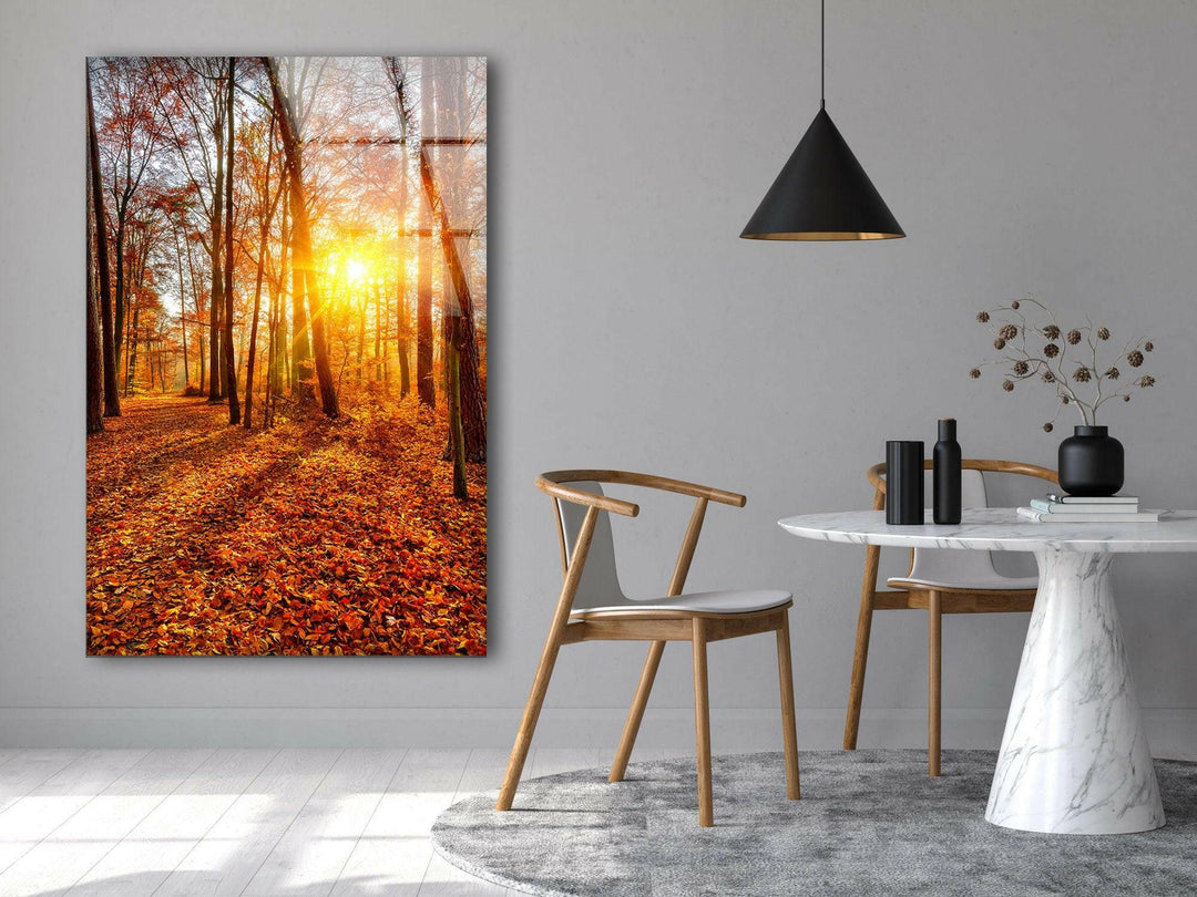 Scenic autumn pathway surrounded by tall trees and glowing foliage, printed on glass.
