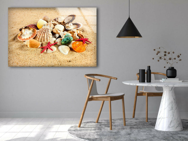 A mesmerizing mix of shells and marine elements placed perfectly on soft beach sand.
