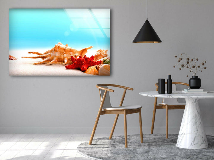 Decorative glass wall art showcasing a tropical seaside scene with vibrant shells.
