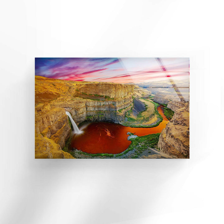 Dramatic rock formations and a waterfall captured in stunning detail.
