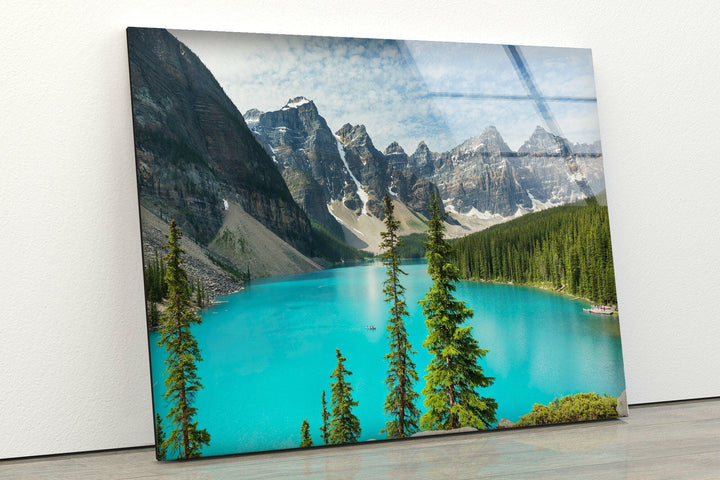 Breathtaking Moraine Lake in vibrant colors, featuring its clear blue waters and snow-capped peaks.
