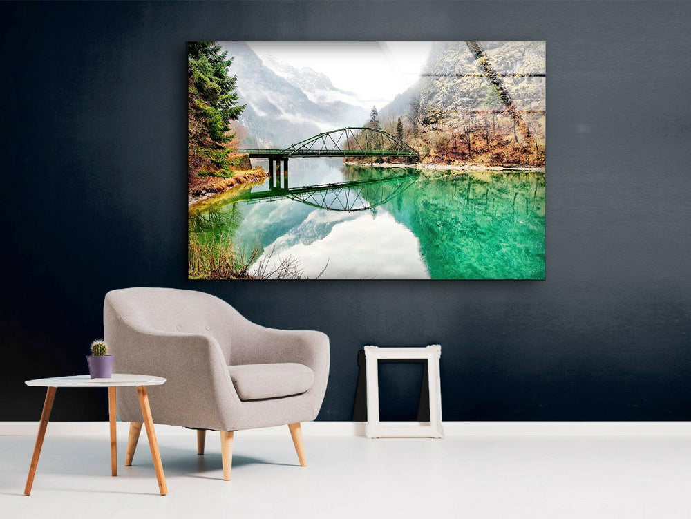 A breathtaking landscape wall art of a serene river reflecting a picturesque bridge.
