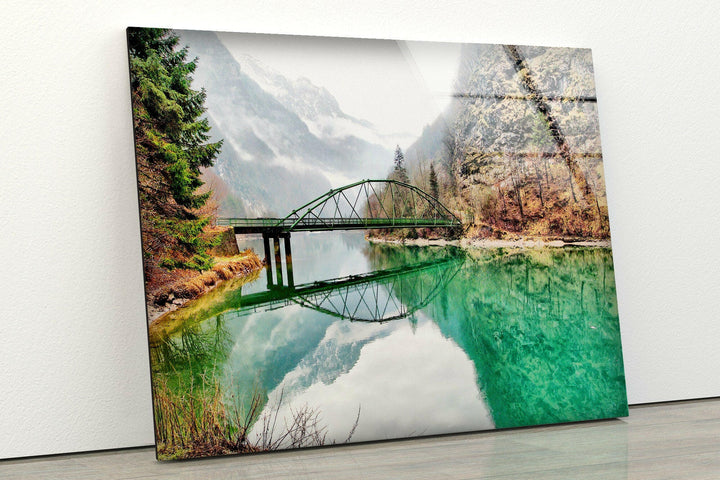 Stunning large landscape wall art capturing a misty morning over an emerald-green river.
