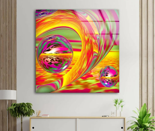 Reflecting light and shadow, this abstract glass wall art captures a swirl of gold, orange, and pink hues.
