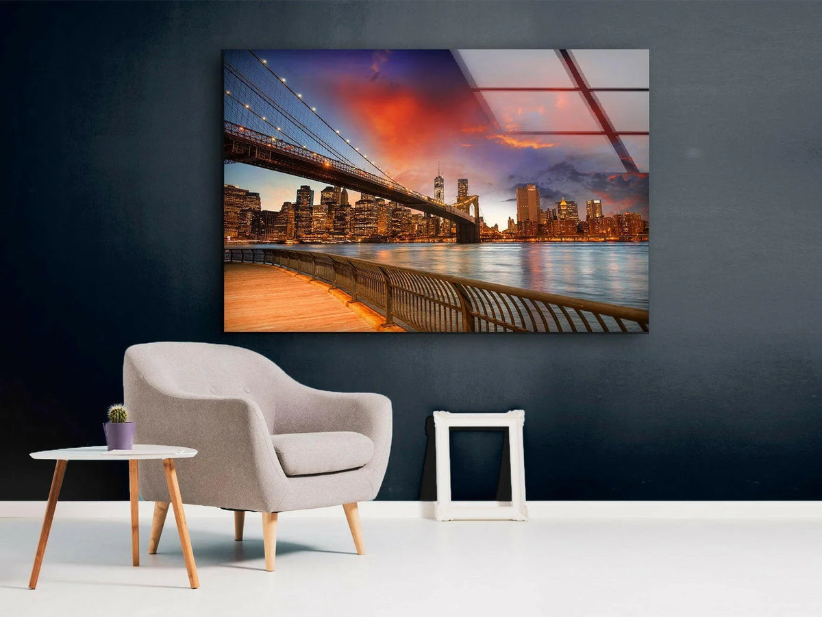 Showcasing the realistic detail, the Brooklyn Bridge Park glass wall art elevates home decor with its stunning cityscape view and reflective, glossy finish.