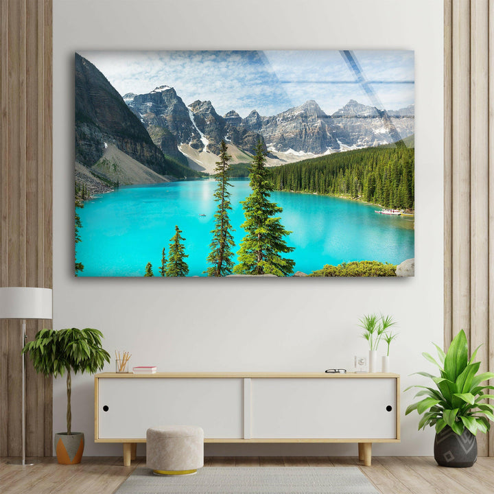 A captivating glass wall piece, featuring the striking blue waters of Moraine Lake nestled between towering peaks.
