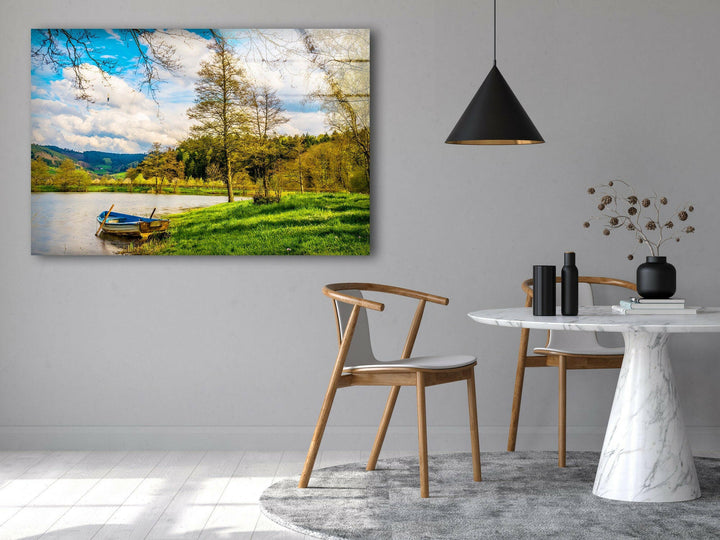 Vivid landscape wall art of a scenic riverside view, surrounded by lush trees and rolling hills.

