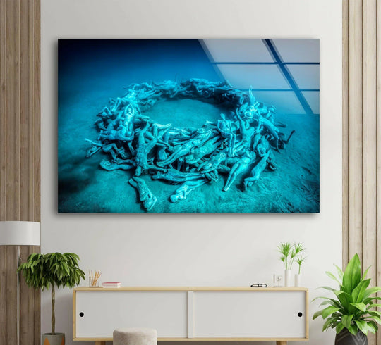 Deep blue glass art painting of a submerged circular sculpture with intense cyan saturation and a high degree of color saturation.