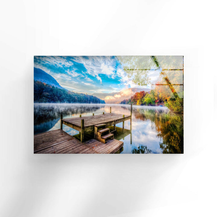 Landscape art featuring a calming lakeside escape with a rustic wooden platform over still waters.

