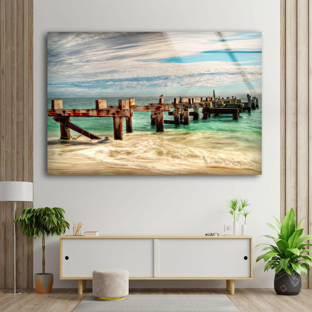 Weathered Wooden Pier Over Turquoise Waters – High-Definition Glass Print
