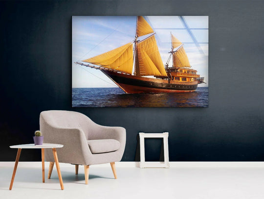 Reflecting the room, the darkest area accentuates the majestic sailing ship in this nautical glass hanging wall art, creating a captivating focal point.