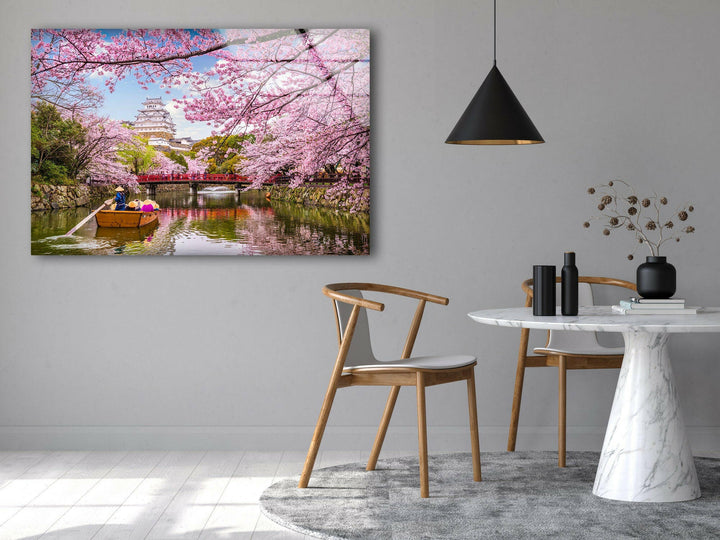 Historic Japanese Castle with Sakura Trees – A Timeless Glass Print
