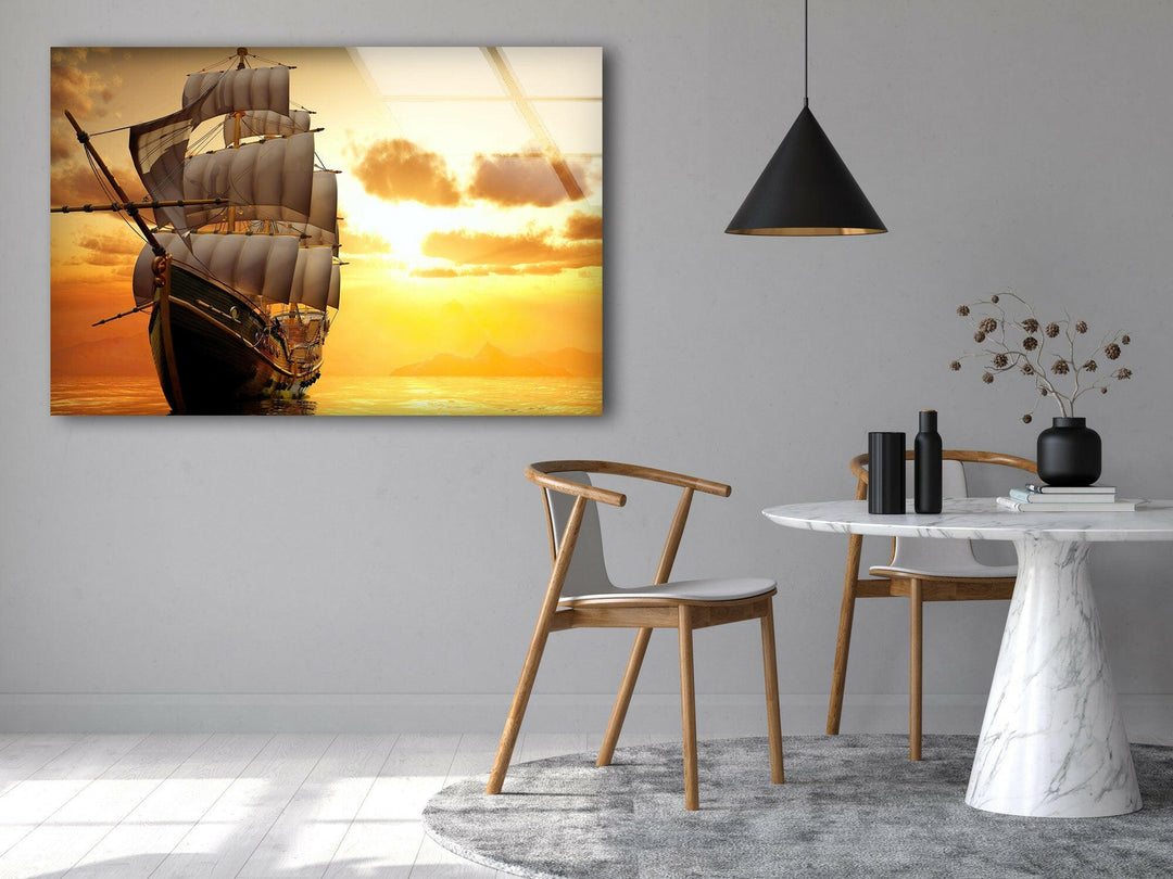 A ship with full sails moves through golden waters, bathed in the warm glow of the sunset.
