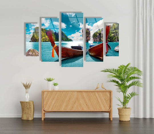 Featuring vibrant color saturation, the Phuket Island boats seascape captured as glass wall art decor depicts a tropical paradise with azure waters and dramatic rock formations.