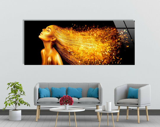 Noting the seamless transition between dark and bright shades, this glass art depicts a gold woman with golden hair, showcasing radiant glass art in a modern design.
