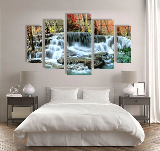 Cascading waterfall landscape glass wall art features a five piece format and a nature scene and is perfect as a five piece wall art decor on a wall