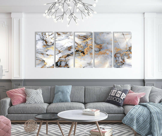 The darkest area features black veining amid the grey and gold marble of this detailed glass wall art, enhancing its appeal as home decor.