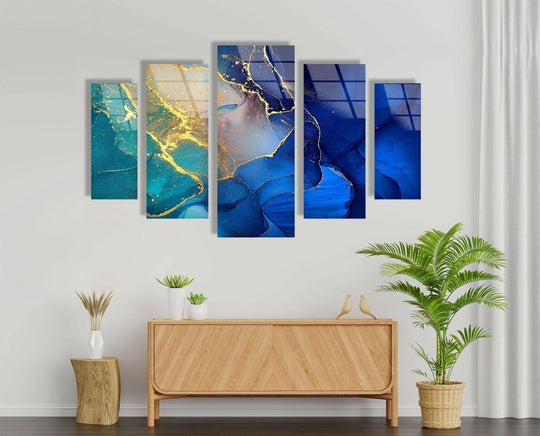 The layered turquoise and blue alcohol ink in this abstract glass wall art highlights the unique modern wall decor with rich texture and depth.