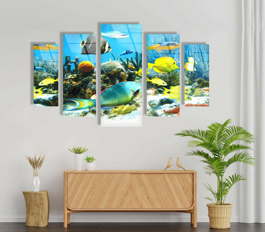 The vibrant underwater scene showcases a school of colorful fish swimming around a coral reef in this five-piece underwater world animal glass art.