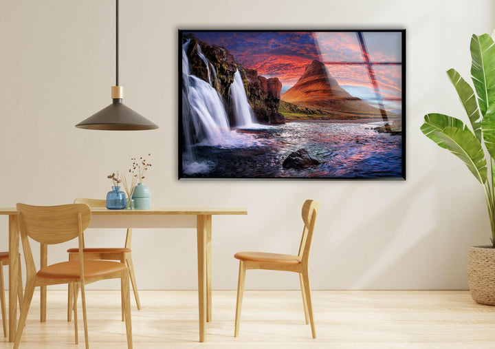 Modern glass wall art highlighting the contrast of rushing water and warm sunset tones.
