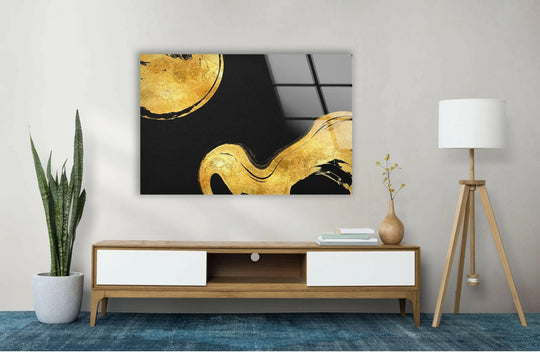 The abstract glass wall art features golden light and shadow playing across black, creating a luxurious sense of depth, perfect for hanging wall art.