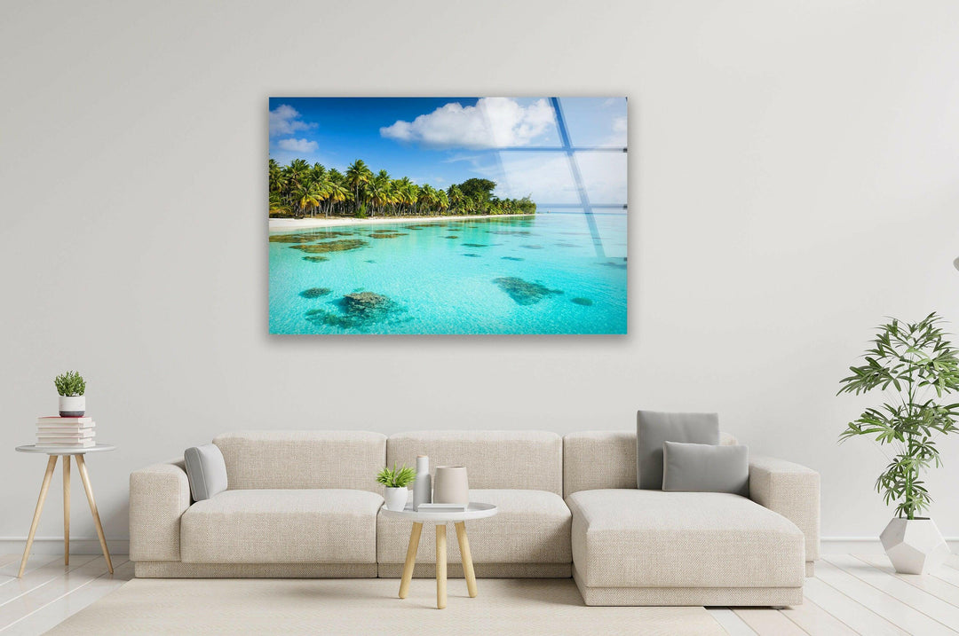 Breathtaking island paradise featuring white sandy beaches and lush palm trees.
