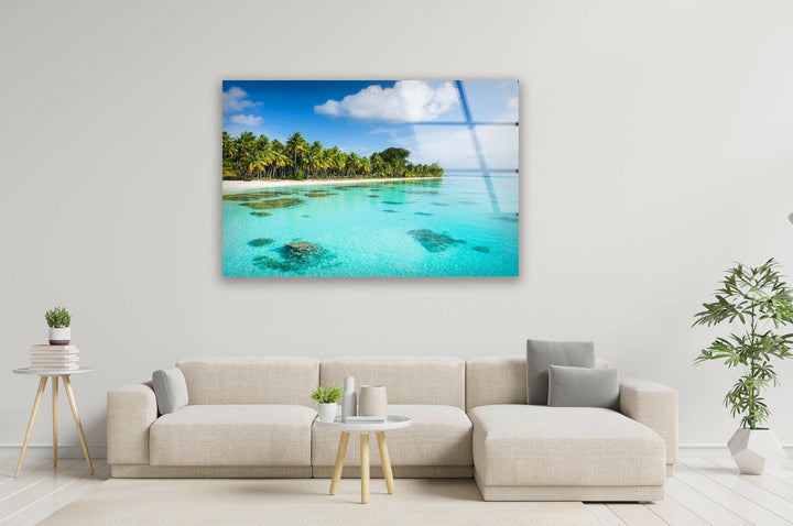 Breathtaking island paradise featuring white sandy beaches and lush palm trees.
