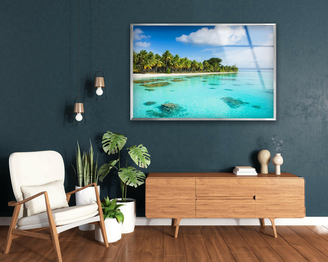 Tranquil ocean view with vibrant coral reefs and lush greenery.
