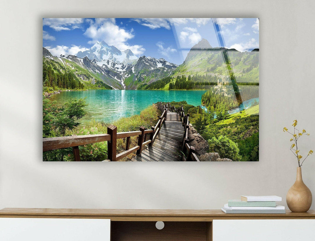 High-definition glass wall art showcasing a serene mountain lake with lush greenery.
