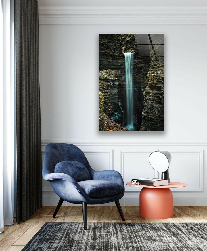 Dreamy waterfall cascading through a hidden canyon, captured in a striking glass wall art print.






