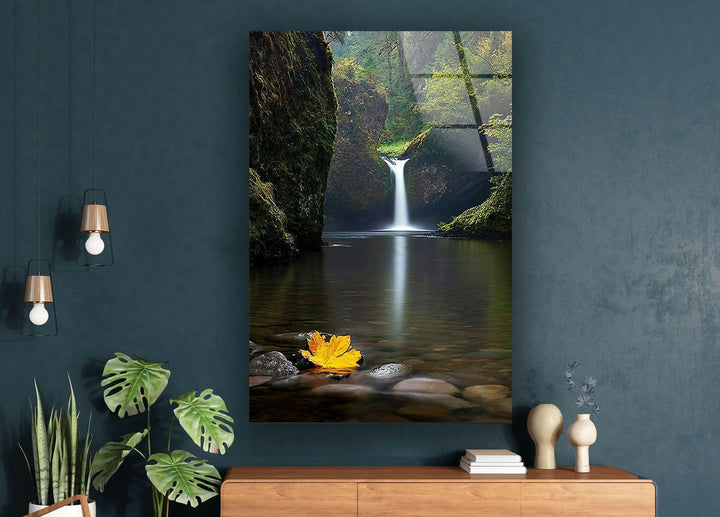 Tranquil nature-inspired glass wall art featuring a peaceful waterfall and still waters.
