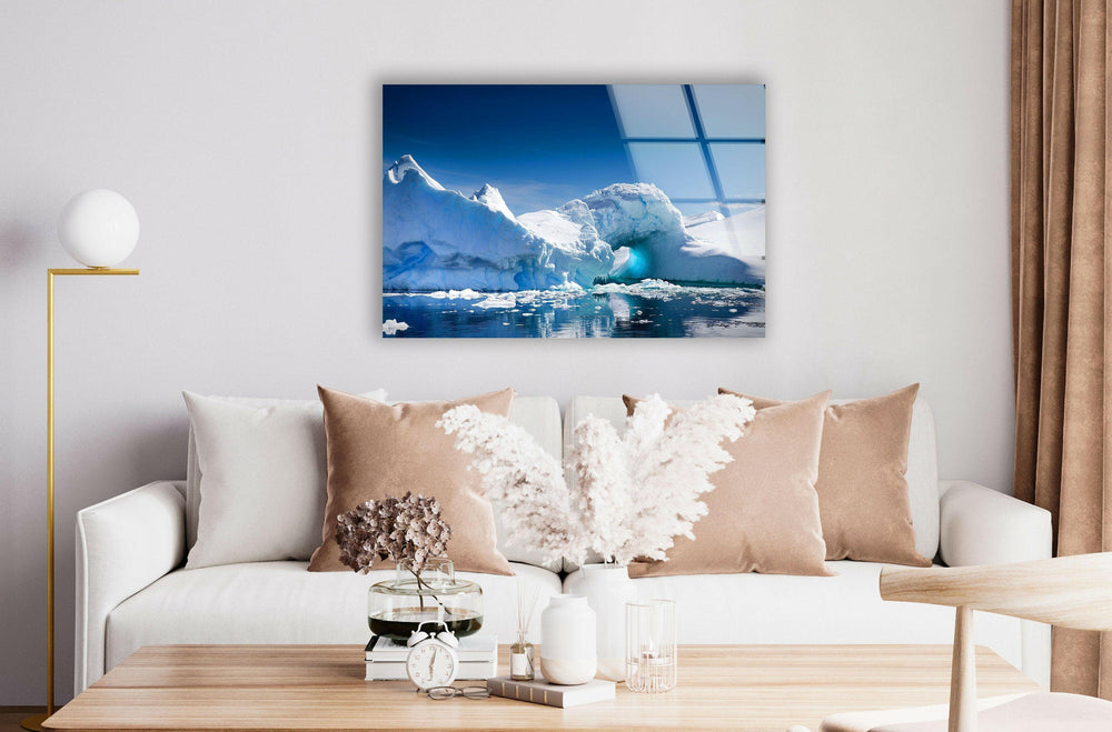 Breathtaking icy landscape with a massive glacier and deep blue reflections on tempered glass.
