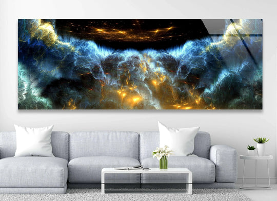 Dark blue clouds abstract glass wall art features a cosmic design and golden accents creating a statement piece above a gray sofa