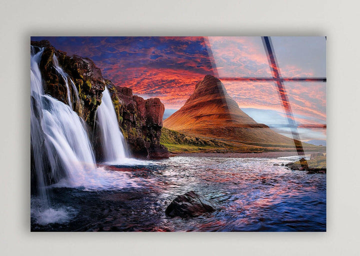 High-definition glass wall art featuring a powerful waterfall and glowing evening sky.
