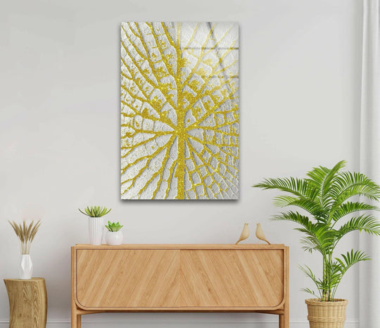 A serene golden tree design on glass wall art brings a tranquil element to home decor.