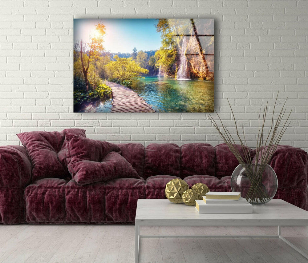 Stunning landscape wall art of a wooden walkway over crystal-clear lakes surrounded by vibrant nature.
