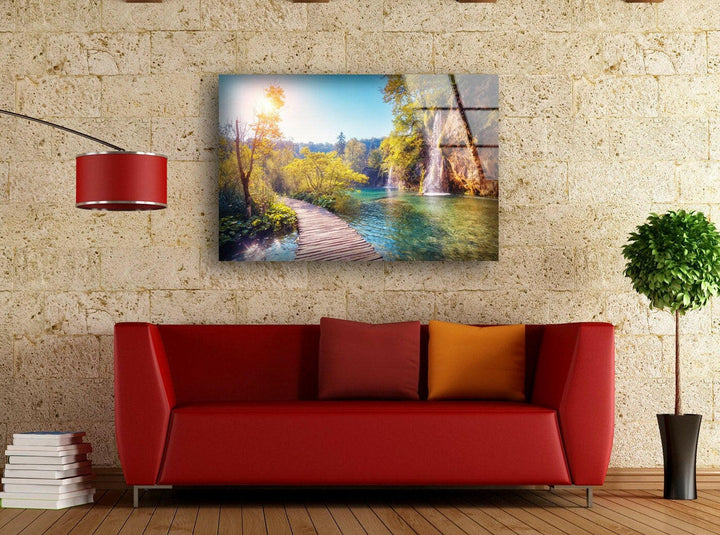 Large landscape wall art showcasing a tranquil forest scene with a wooden path leading through the lake.
