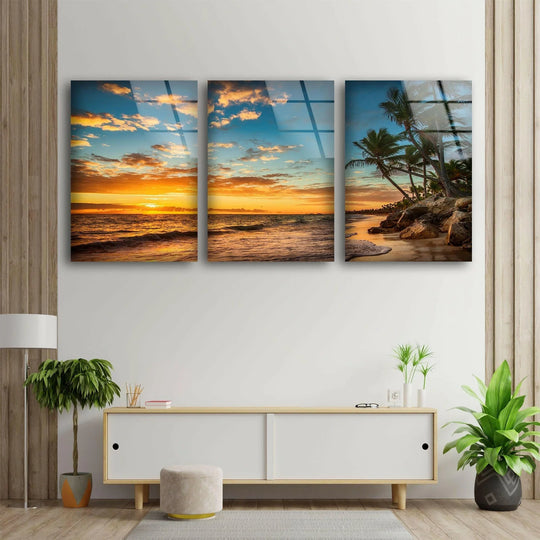 Tropical island beach sunrise glass wall art shows a serene coastal landscape and is sunrise beach decor and a vibrant tropical island art piece on display