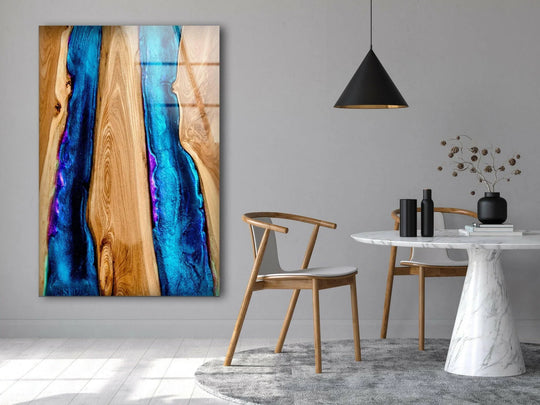 Stillness embodies the deep blue epoxy river flowing through this captivating wood and glass printing.
