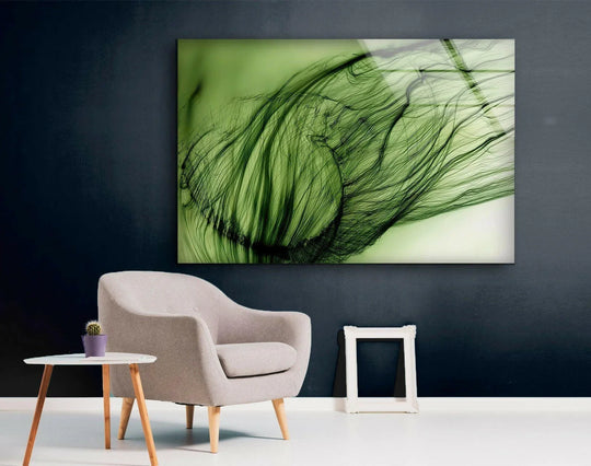 A serene glass art painting featuring abstract green swirls evokes a sense of tranquil stillness.