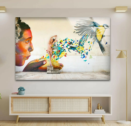 Fantasy graffiti glass wall art depicting a woman emerging from a colorful explosion of geometric shapes into a bird, offering a dynamic play of depth and layers for home decor.