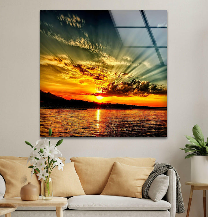 Glistening Golden Waters: A sunset reflecting beautifully on the ocean's surface.
