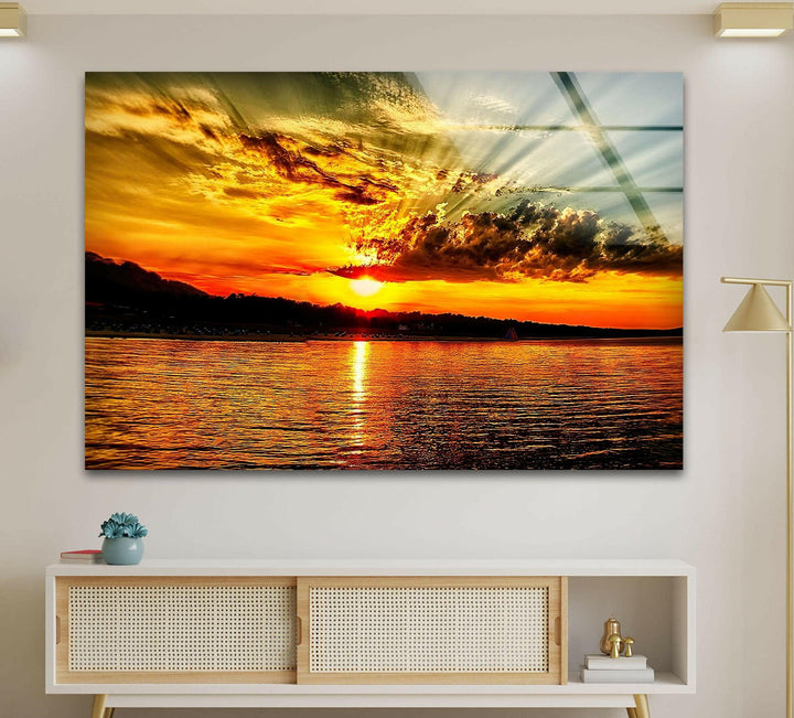 Serene Sunset Over the Ocean: A peaceful beach sunset with golden reflections on calm waters.
